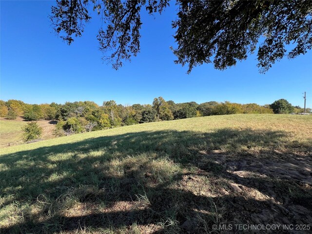 5804 Samuel Rd, Kingston, OK 73439 - view of wooded area with a view of countryside