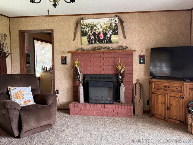 5804 Samuel Rd, Kingston, OK 73439 - living area featuring ornamental molding, carpet, and a fireplace