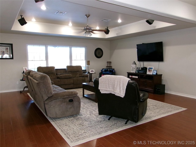 10500 W 123rd Rd, Oktaha, OK 74450 - living room featuring ceiling fan, dark hardwood / wood-style floors, a tray ceiling, and ornamental molding
