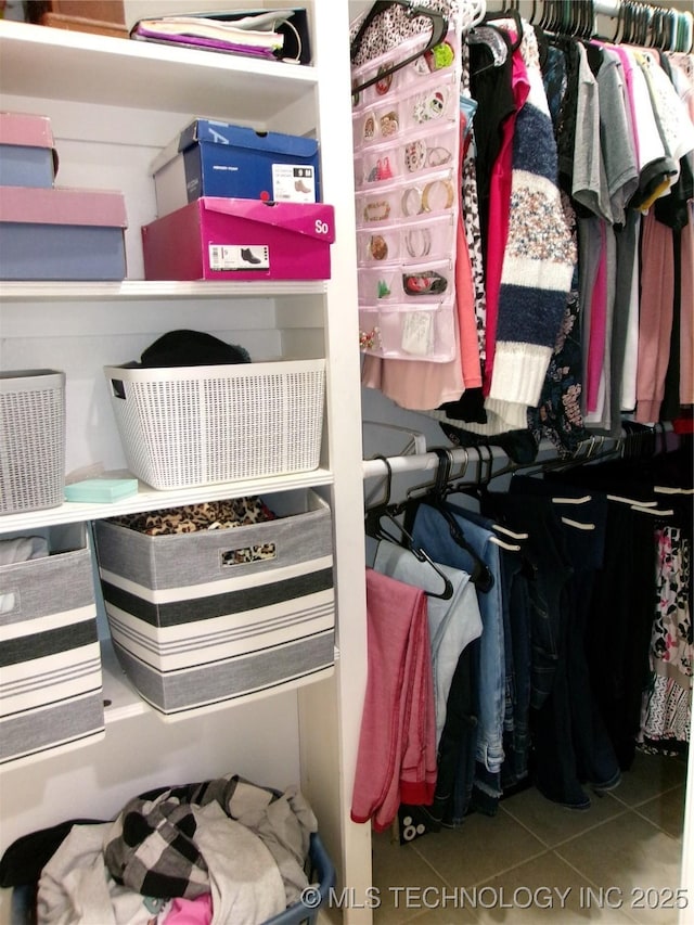 10500 W 123rd Rd, Oktaha, OK 74450 - walk in closet with tile patterned flooring