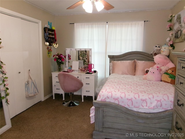 10500 W 123rd Rd, Oktaha, OK 74450 - bedroom with ceiling fan, a closet, and carpet floors