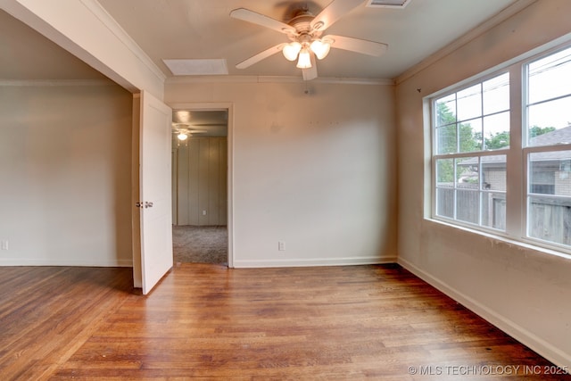 empty room with light hardwood / wood-style floors, crown molding, and ceiling fan