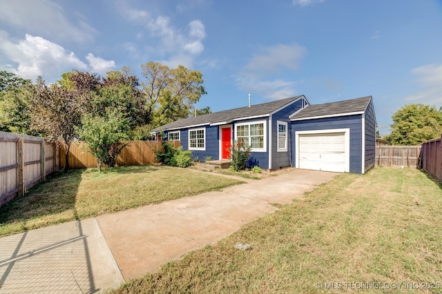 ranch-style home with a front lawn and a garage