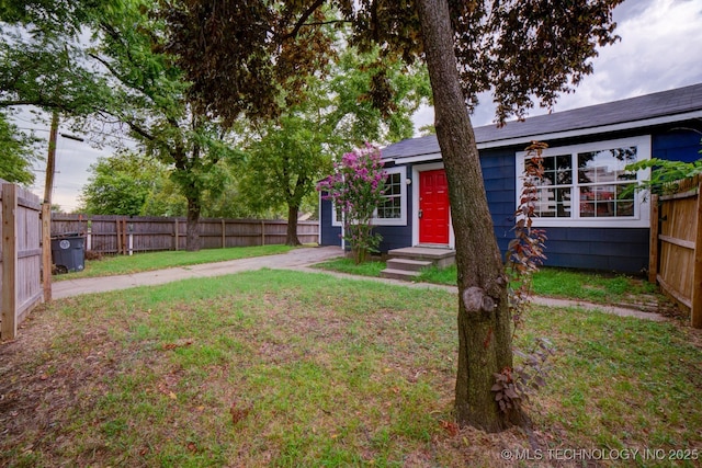 view of front of home with a front lawn