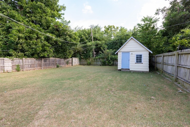 view of yard featuring a storage unit