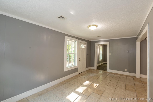 entryway featuring crown molding and a textured ceiling