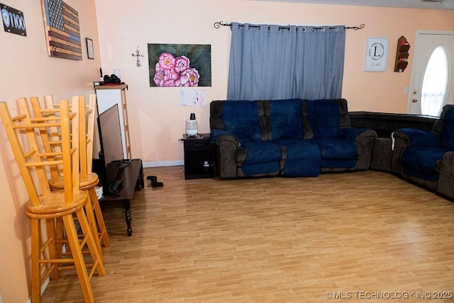 1799 W Main St, Westville, OK 74965 - living room with light wood finished floors