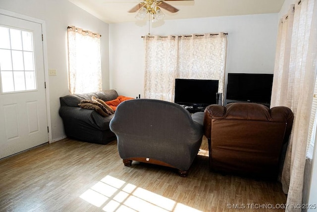 1799 W Main St, Westville, OK 74965 - living area with wood finished floors and a ceiling fan