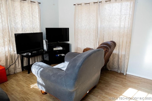 1799 W Main St, Westville, OK 74965 - living room with wood finished floors and baseboards