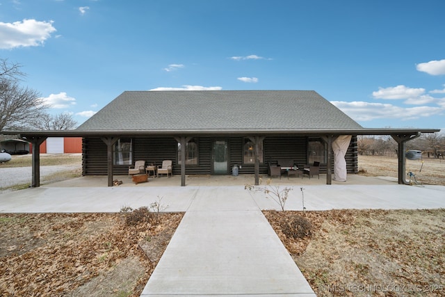 view of front of home featuring a patio area