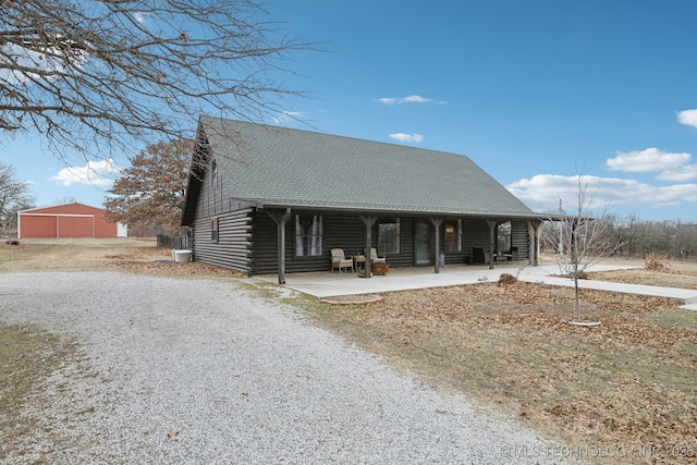 view of log-style house