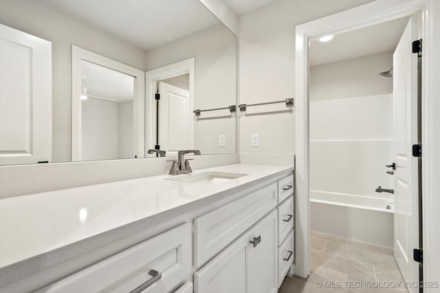 full bathroom featuring shower / bath combination and vanity