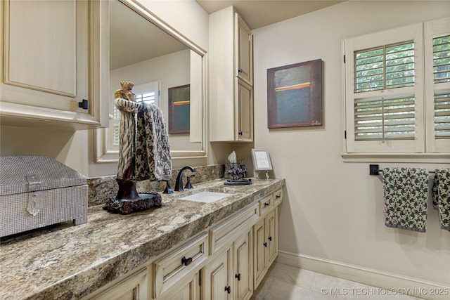 bathroom featuring vanity and tile patterned flooring