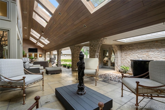 view of patio with french doors and outdoor lounge area