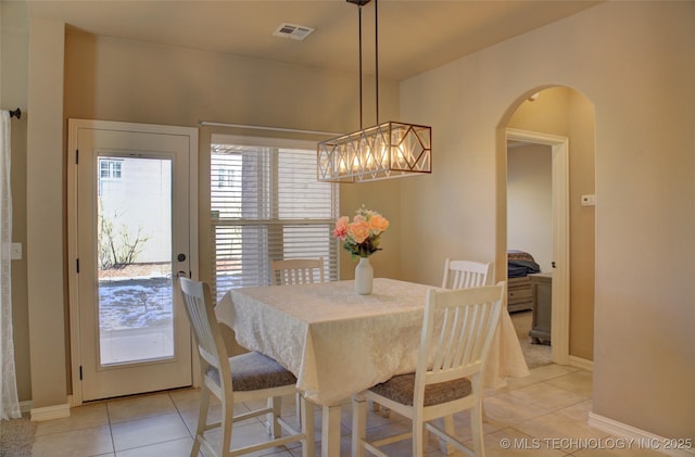 tiled dining space with plenty of natural light