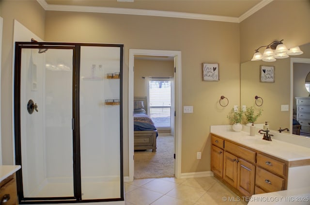 bathroom with a shower with shower door, tile patterned floors, vanity, and ornamental molding