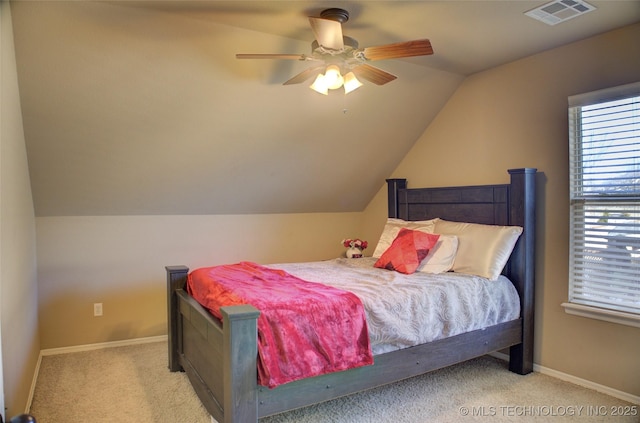 bedroom with light carpet, ceiling fan, and lofted ceiling