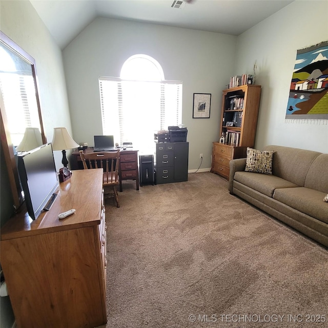 office area with carpet floors and lofted ceiling