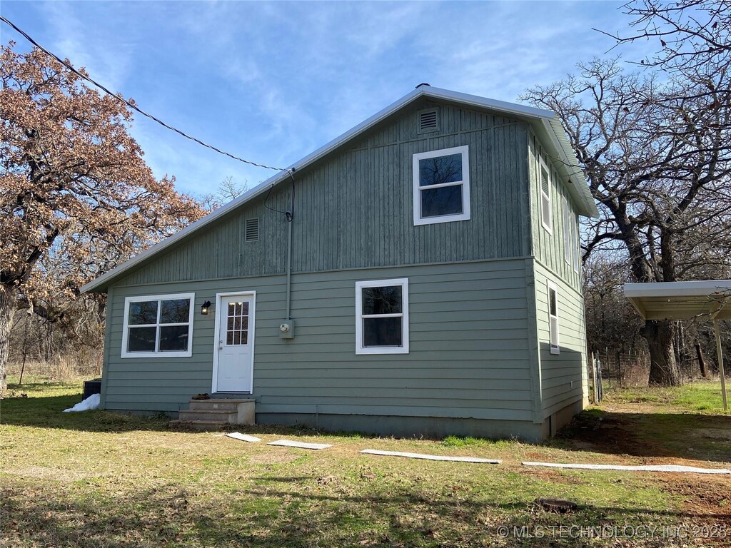 258 Nugget Rd, Lone Grove, OK 73443 - back of house with a yard