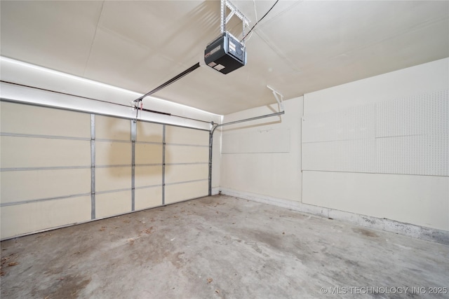 garage featuring a garage door opener