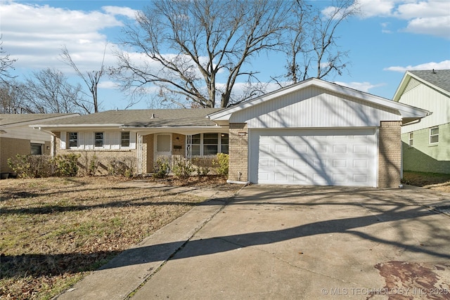 ranch-style home with a garage and a porch