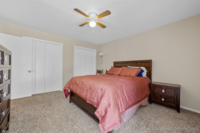 bedroom featuring ceiling fan and light carpet