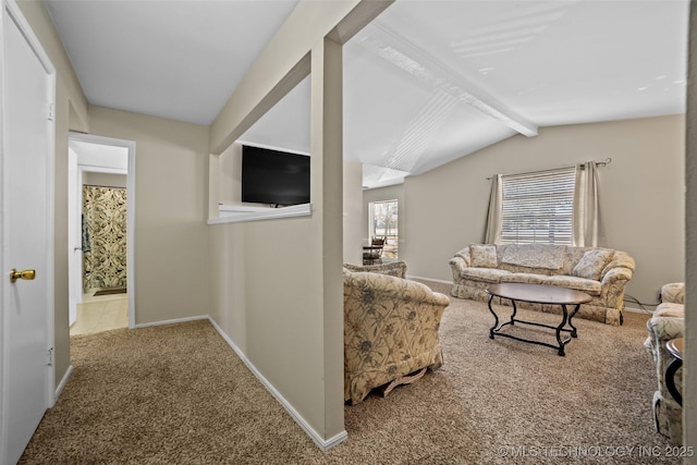 living room with carpet flooring and lofted ceiling with beams