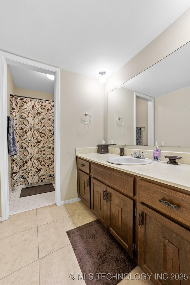 bathroom featuring vanity and tile patterned floors