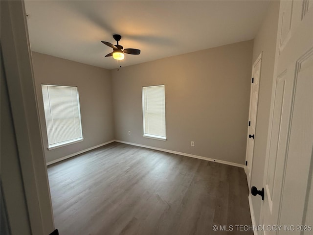 empty room featuring ceiling fan and wood-type flooring