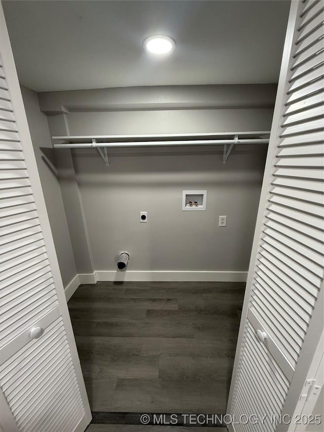 laundry room with dark wood-type flooring, hookup for a washing machine, and hookup for an electric dryer