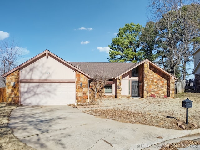 ranch-style house featuring a garage