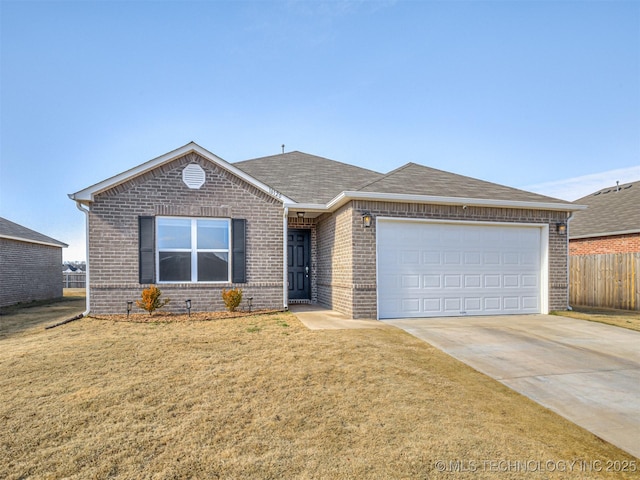 single story home with a garage and a front yard