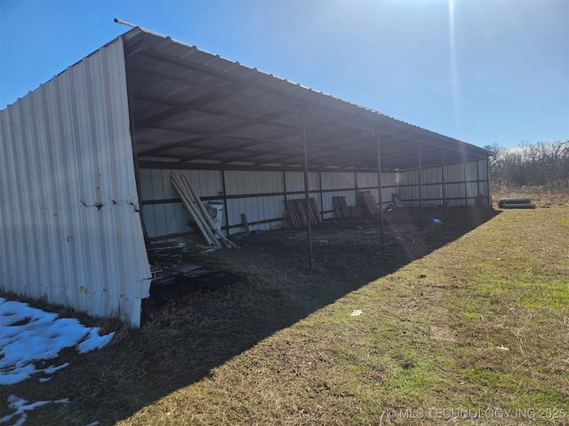 view of outdoor structure with a yard