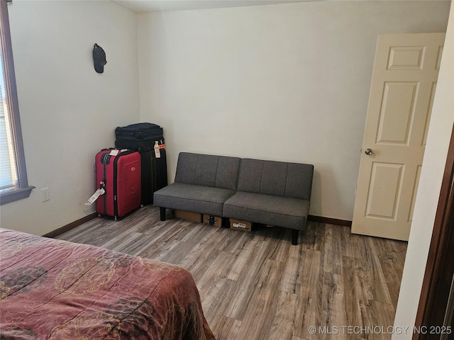 bedroom featuring hardwood / wood-style flooring