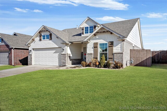 craftsman house with a garage and a front yard