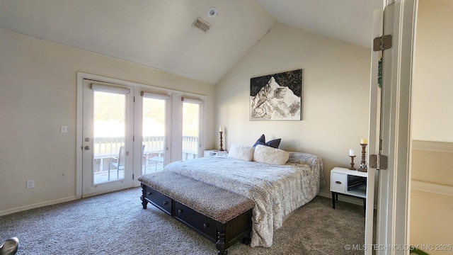 carpeted bedroom featuring access to exterior and lofted ceiling