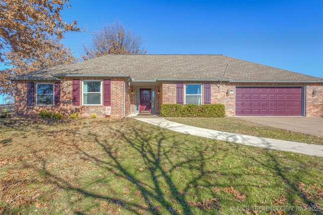 ranch-style house with a garage and a front yard