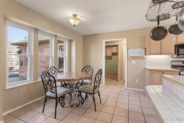 dining room with light tile patterned floors