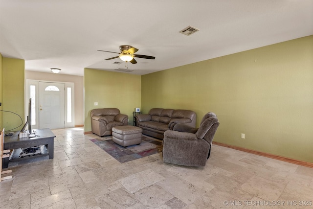 living room featuring ceiling fan