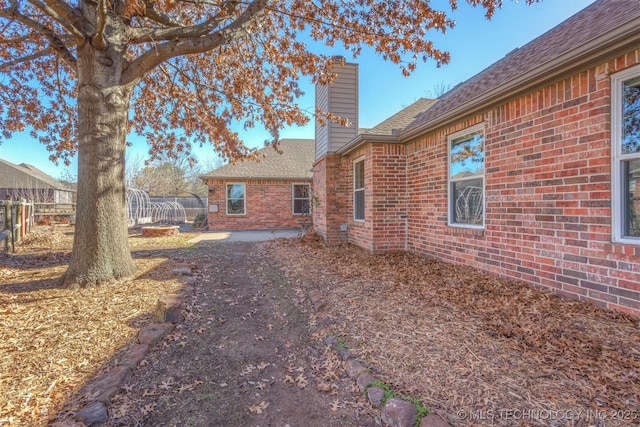 back of house with a patio