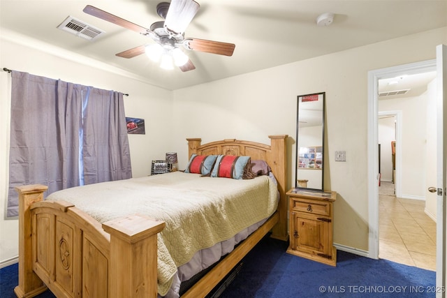 bedroom featuring ceiling fan and light tile patterned floors