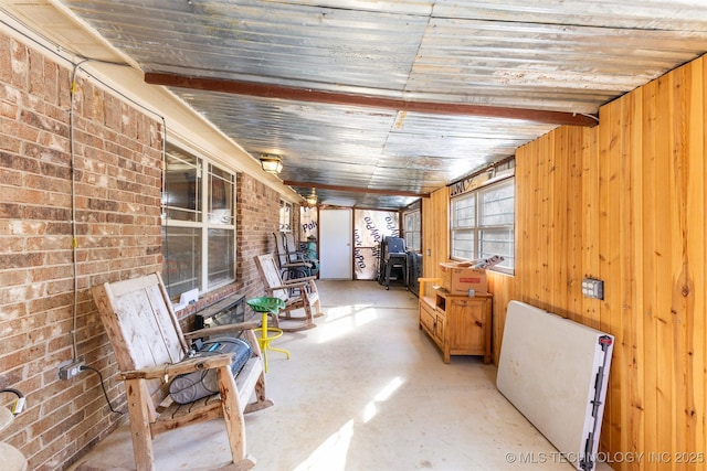 interior space featuring beam ceiling