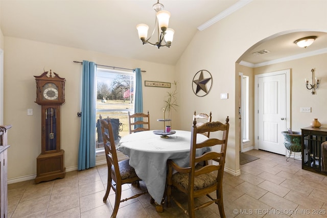 dining room with vaulted ceiling, light tile patterned floors, and a notable chandelier