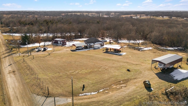 birds eye view of property featuring a rural view