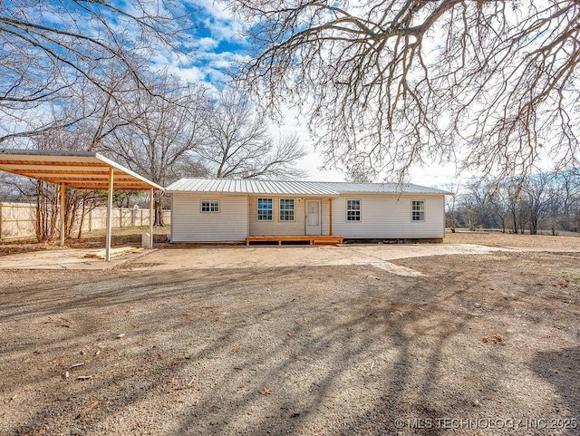 view of front of house featuring a carport