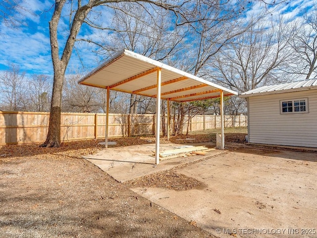 view of patio featuring an outbuilding