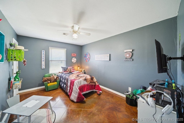 bedroom featuring ceiling fan and tile patterned floors
