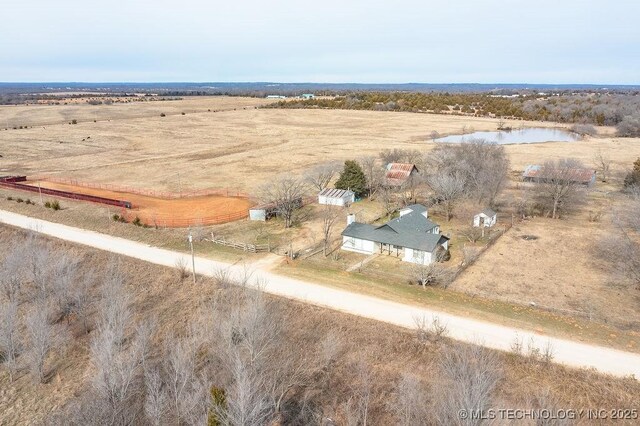 drone / aerial view with a rural view and a water view