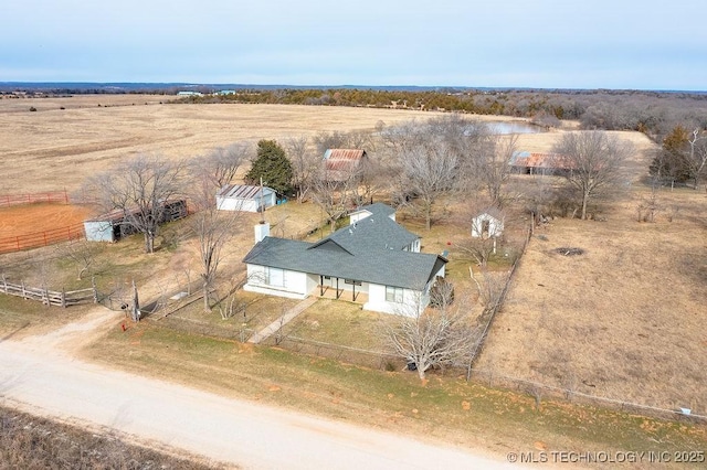 birds eye view of property featuring a rural view