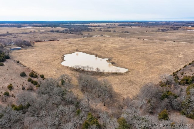 birds eye view of property with a rural view